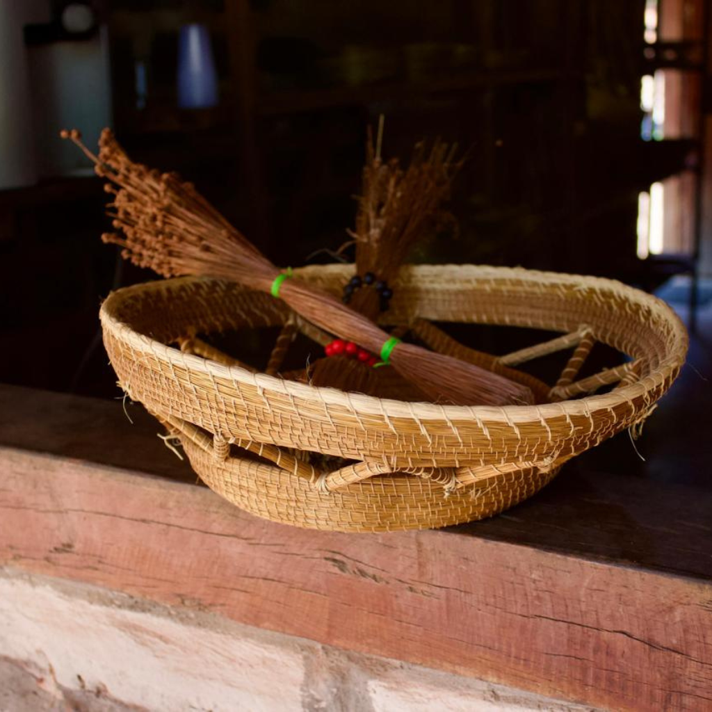 handwoven zig-zag fruit basket made from sustainable golden grass, perfect for home décor