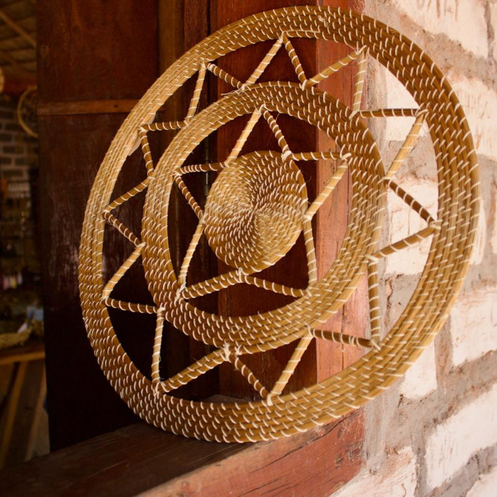 Handcrafted Brazilian golden grass wall mandala, sustainable boho home decor from Jalapão