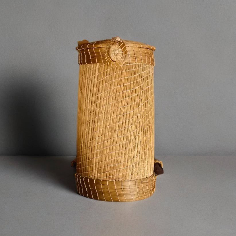 Handwoven Golden Harvest Basket crafted with sustainable Golden Grass by Brazilian artisans